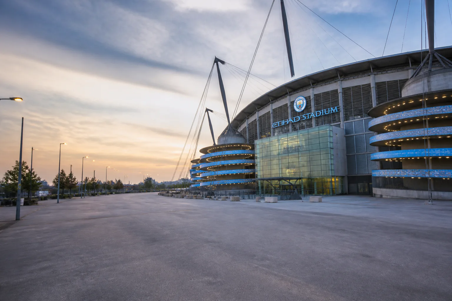 Etihad Stadium exterior at dusk